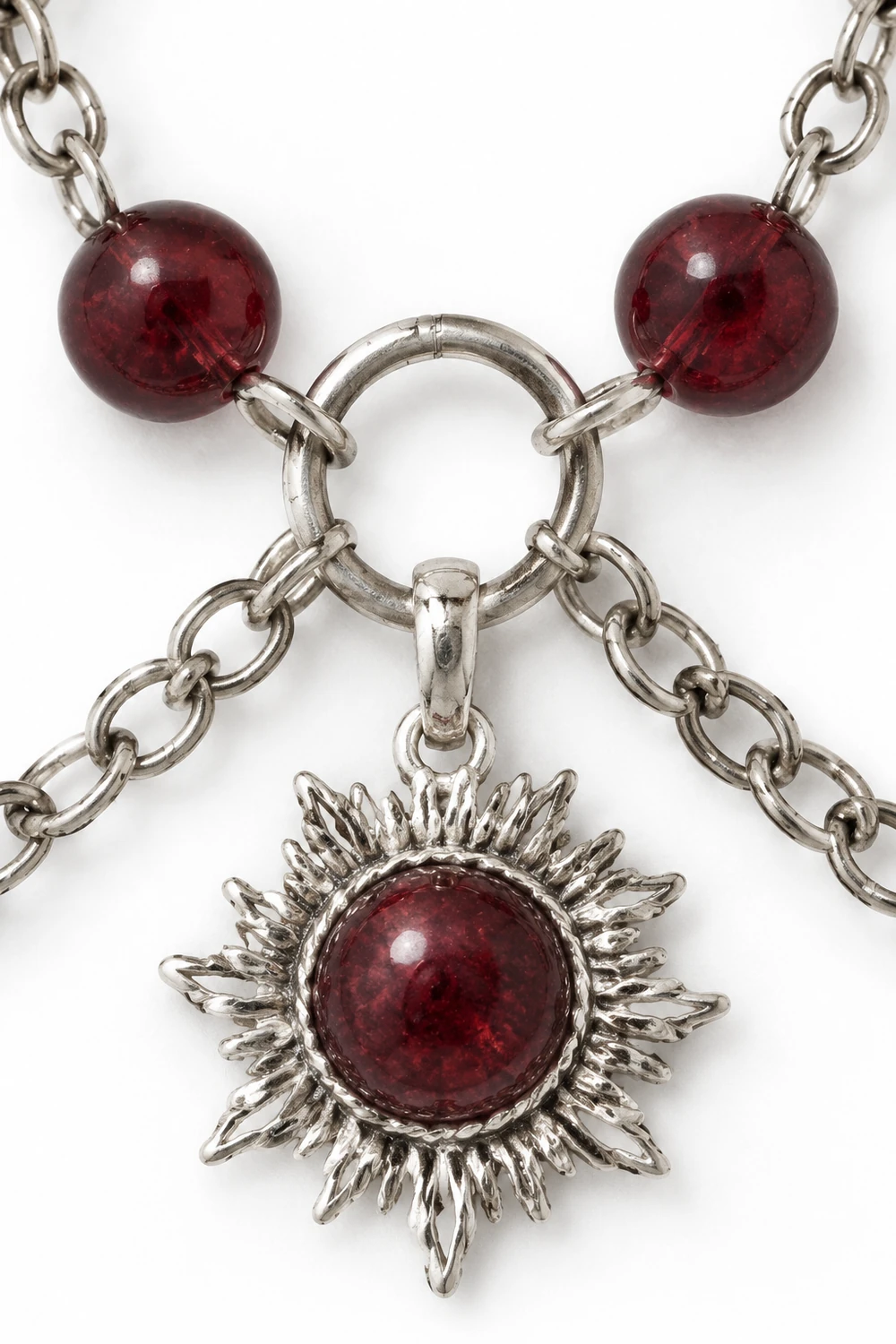 Lal (Garnet) 7mm ve Oniks 6mm Taşlı Güneş Uçlu Zincirli Kolye taş dokusu yakın çekim